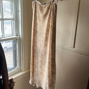 Long elegant legs size large stretchy flowery yellow skirt